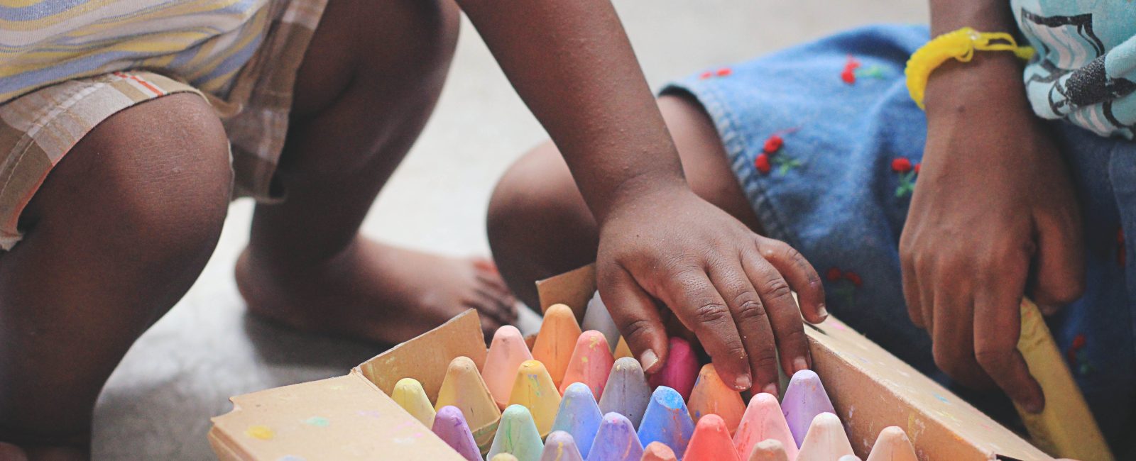 Children playing with crayons