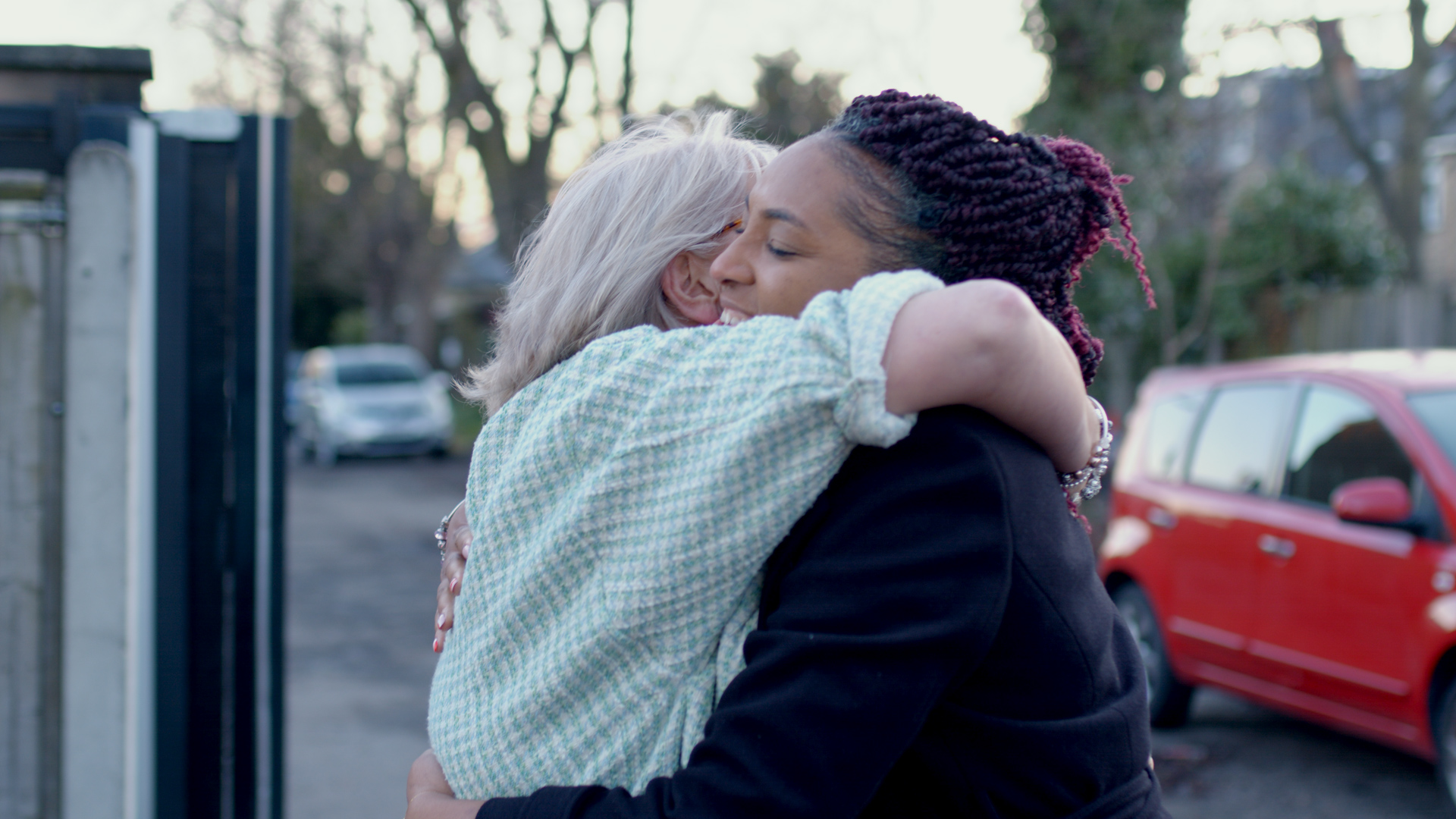 Joan and Bunmi hugging